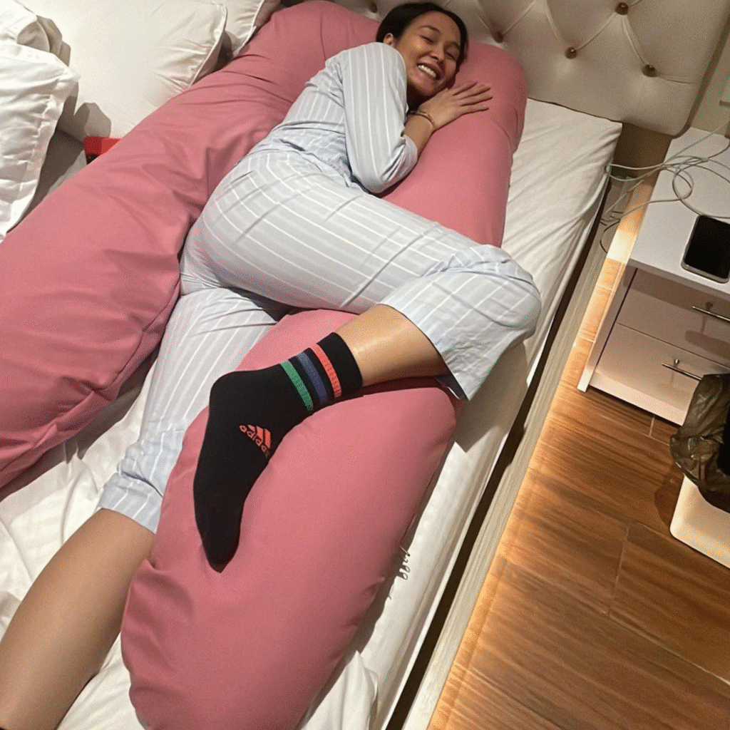 Lovely Abella featured with OMGPH pregnancy pillow providing comfort and full body support